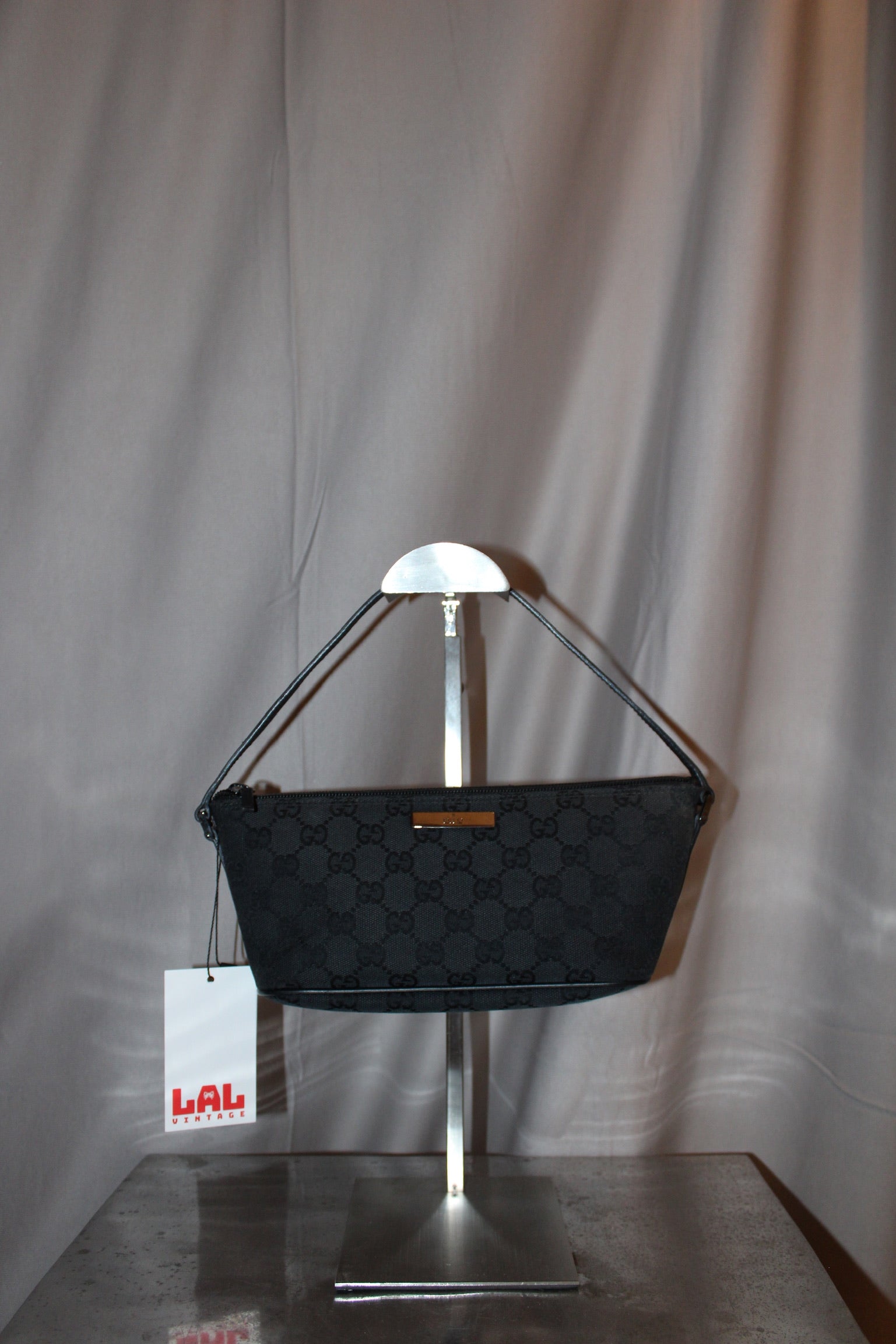 Gucci Monogram Pouch Bag