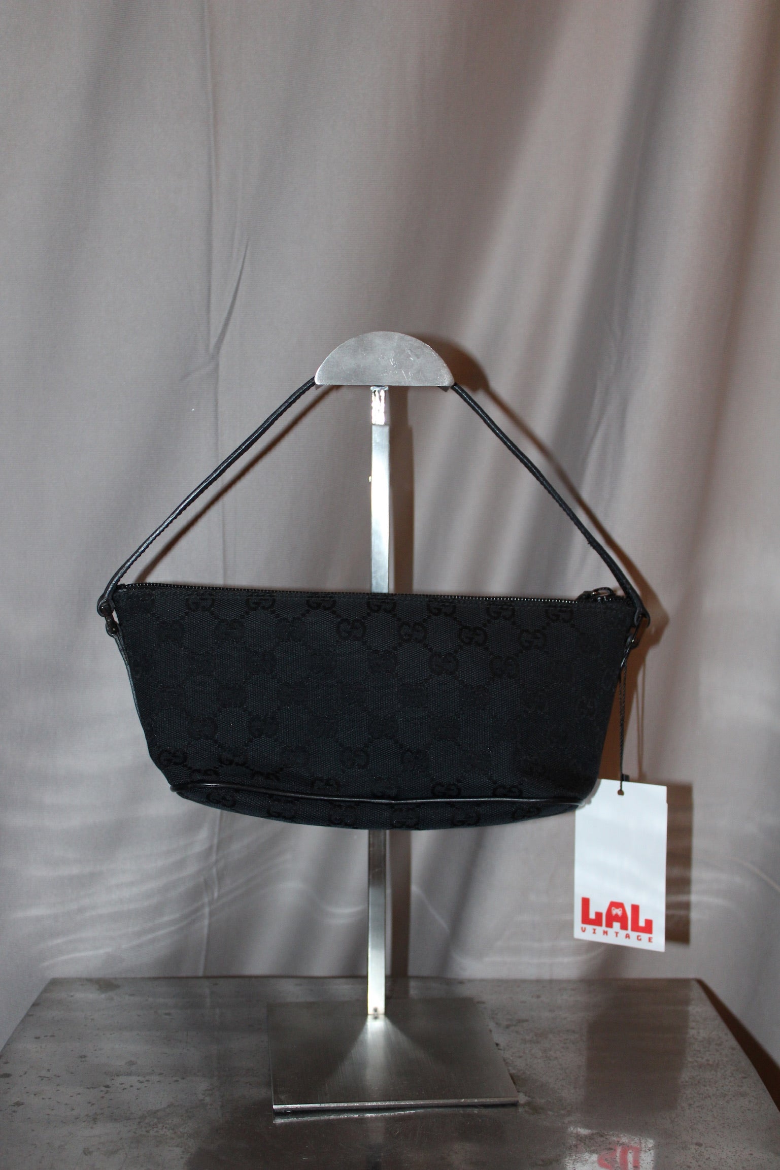 Gucci Monogram Pouch Bag