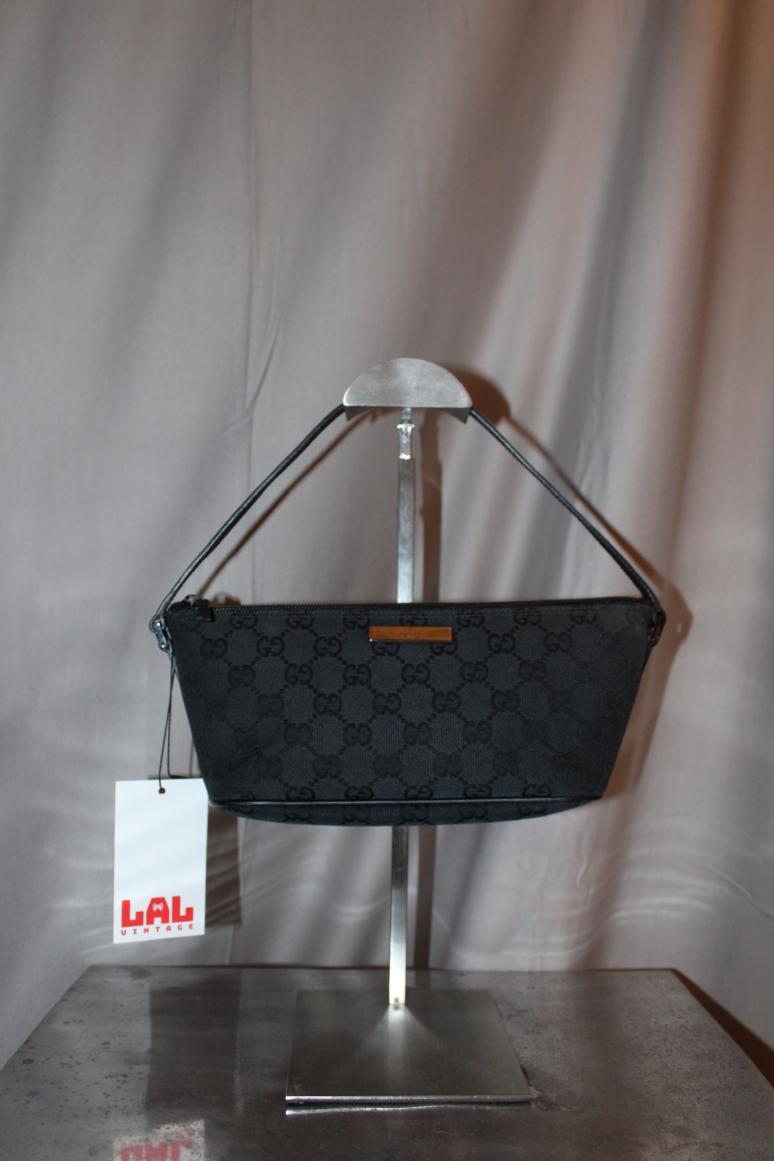 Gucci Monogram Pouch Bag